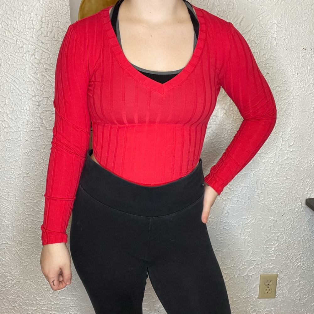 A pink bodysuit